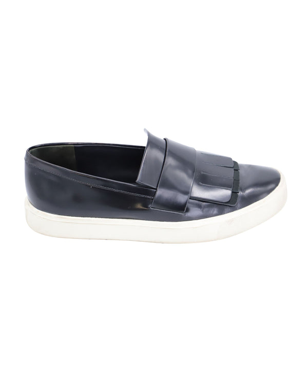 Women's Vince Conventry Kiltie Fringe Slip-On Sneakers in Black Leather
