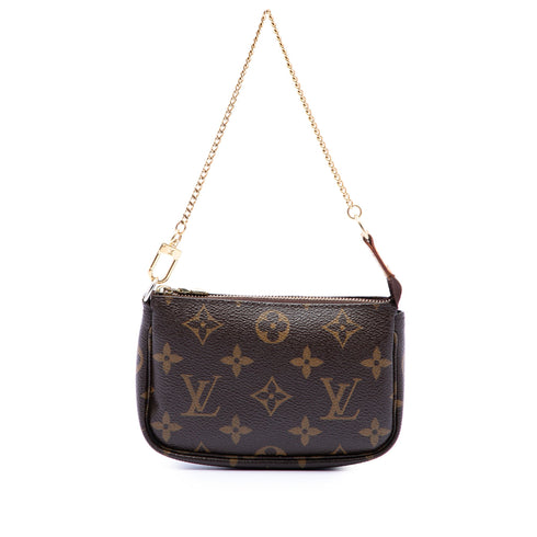 Pochette Accessoires Monogram Canvas Mini
