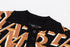 AMIRI Repeat intarsia-knit polo shirt