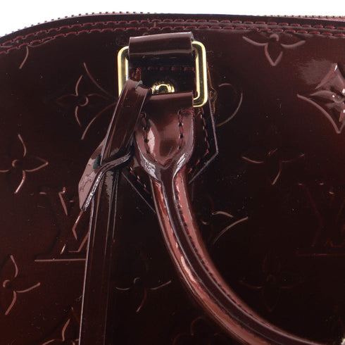 Alma Handbag Monogram Vernis PM