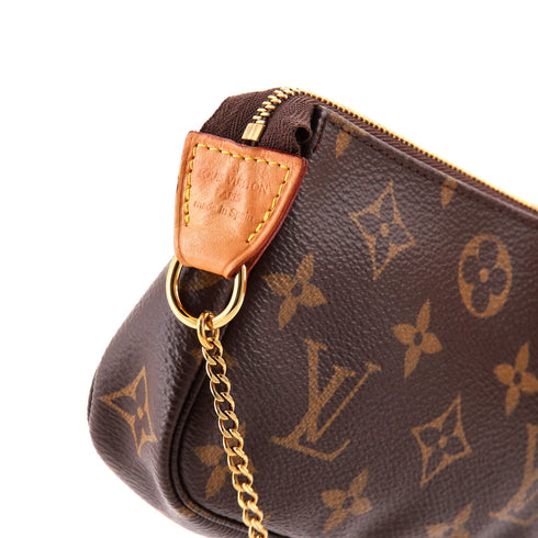 Pochette Accessoires Monogram Canvas Mini