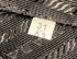 Symbole Triangle Bag Leather and Jacquard Mini