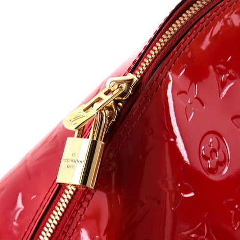 Alma Handbag Monogram Vernis PM