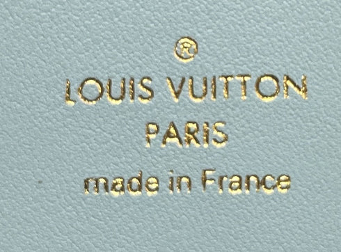 Capucines Vertical Wallet Leather Compact