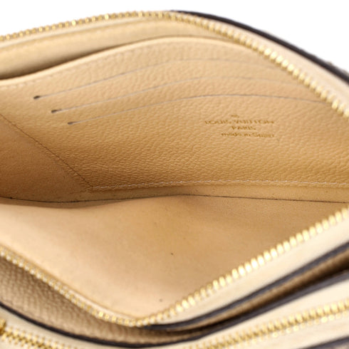 Double Zip Pochette Monogram Empreinte Leather with Python
