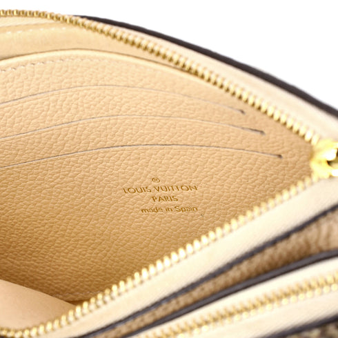 Double Zip Pochette Monogram Empreinte Leather with Python