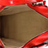 Dora Handbag Monogram Canvas and Calfskin PM