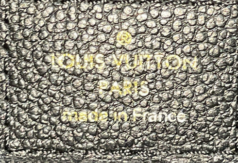 Daily Pouch Monogram Empreinte Leather