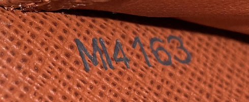 Zippy Wallet Monogram Canvas