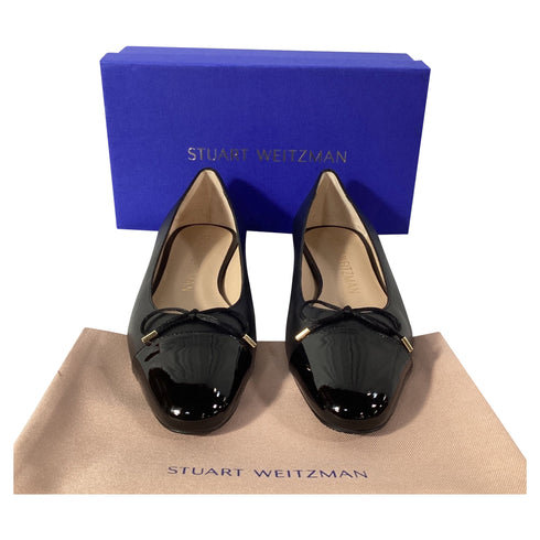Women's Stuart Weitzman Sleek Cap Toe Bow Flats in Black Leather