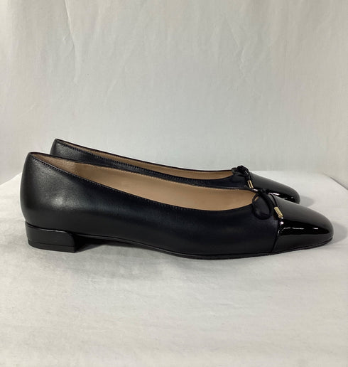 Women's Stuart Weitzman Sleek Cap Toe Bow Flats in Black Leather