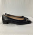 Women's Stuart Weitzman Sleek Cap Toe Bow Flats in Black Leather