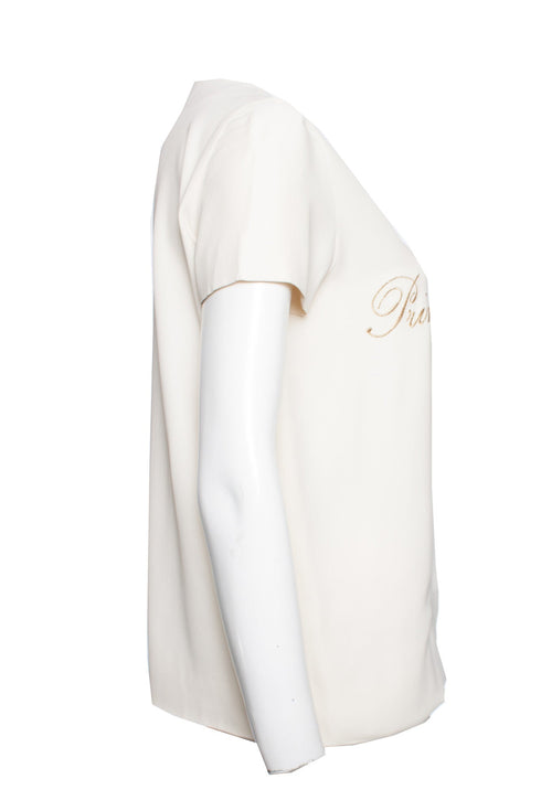 Women's Moschino Couture, Cream-colored top with gold text.