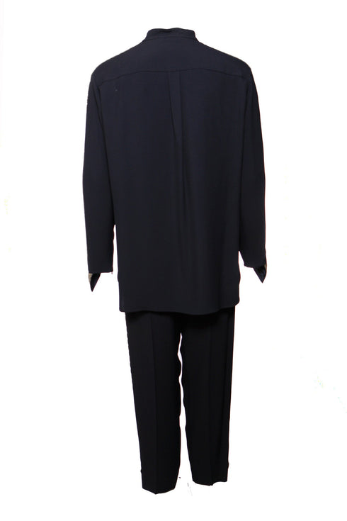 Women's Chloe, Dark blue trousers (36/XS) and blouse (38/S) with silver embroidery along the sleeves and legs.