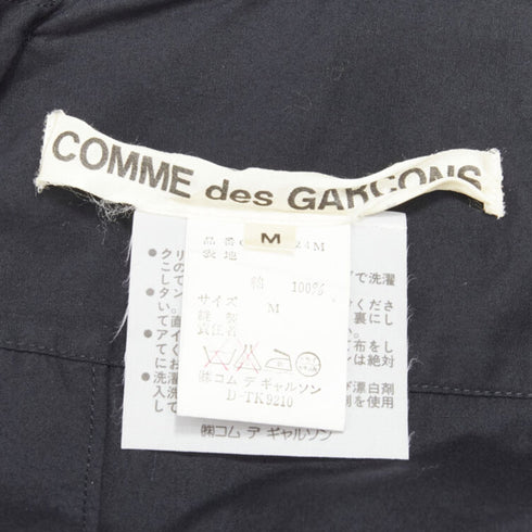 Women's Comme des Garcons asymmetric tiered flared tie back shirt