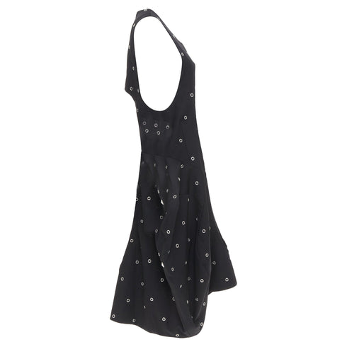 Women's Comme des Garcons black wool silver grommet cut out pannier dress