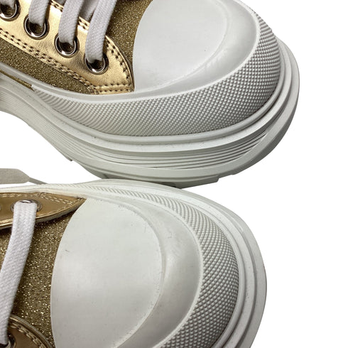 Women's Alexander McQueen Tread Slick Glitter Sneakers in Metallic Gold Canvas