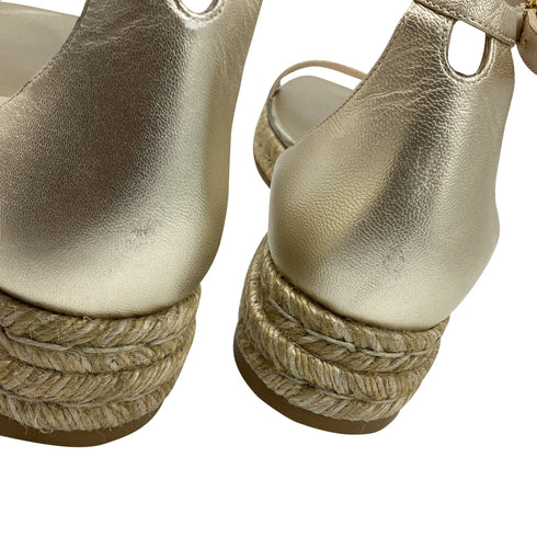Women's Stuart Weitzman Nudistcurve Espadrille Flat Sandals in Metallic Gold Leather