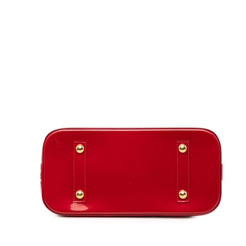 Alma Handbag Monogram Vernis PM