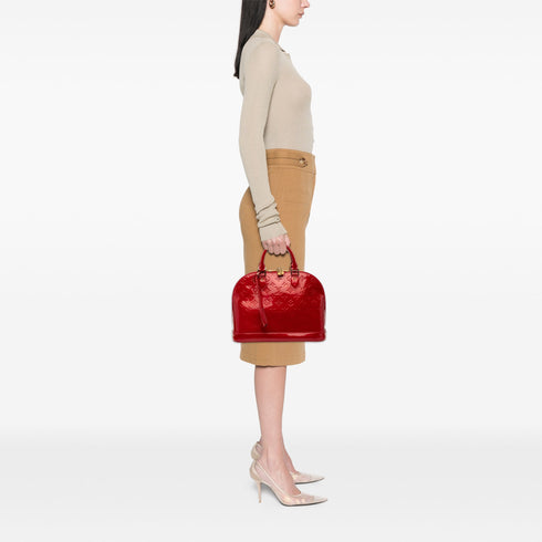 Alma Handbag Monogram Vernis PM
