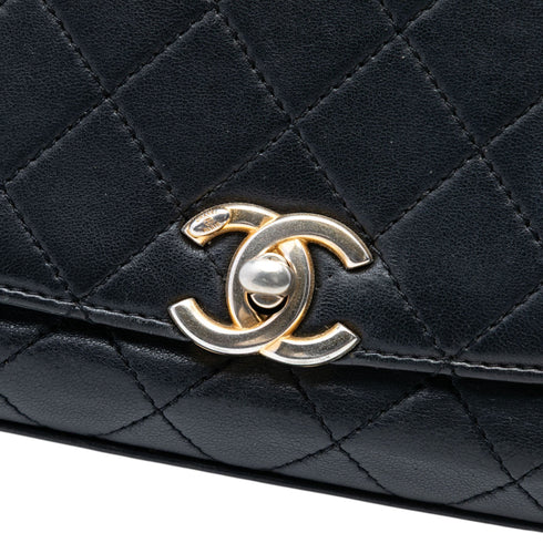 La Parisienne Chain Top Handle Flap Bag Quilted Lambskin Medium