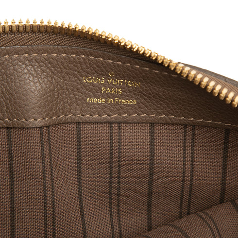 Petillante Clutch Monogram Empreinte Leather