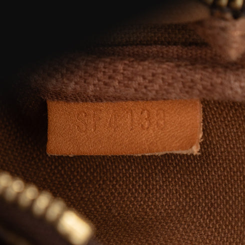 Pochette Accessoires Monogram Canvas Mini