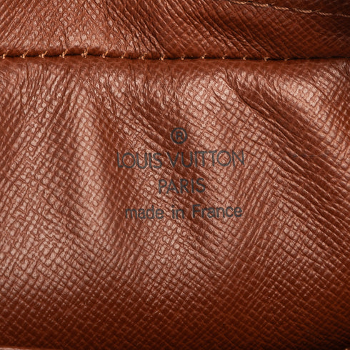 Cite Pochette Monogram Canvas