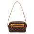 Cite Pochette Monogram Canvas
