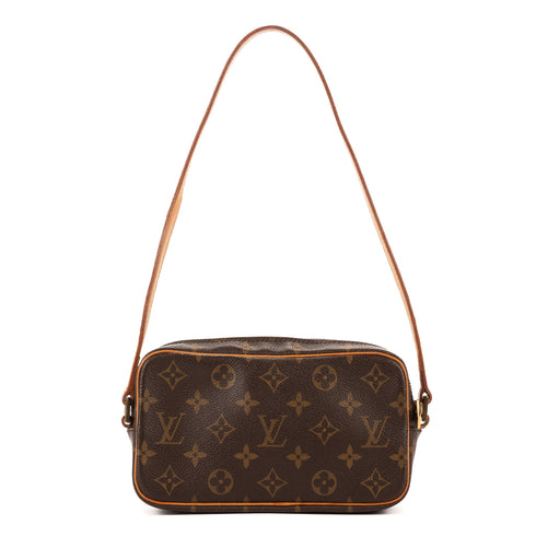Cite Pochette Monogram Canvas