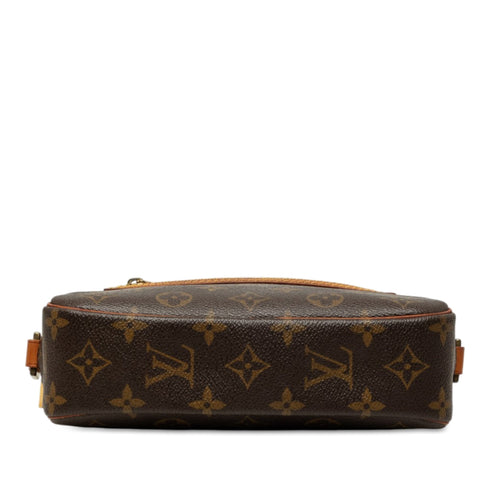 Cite Pochette Monogram Canvas