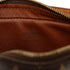 Cite Pochette Monogram Canvas