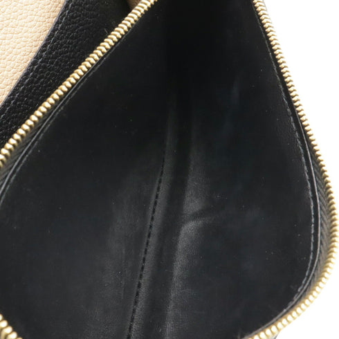 Emilie Wallet Monogram Empreinte Leather