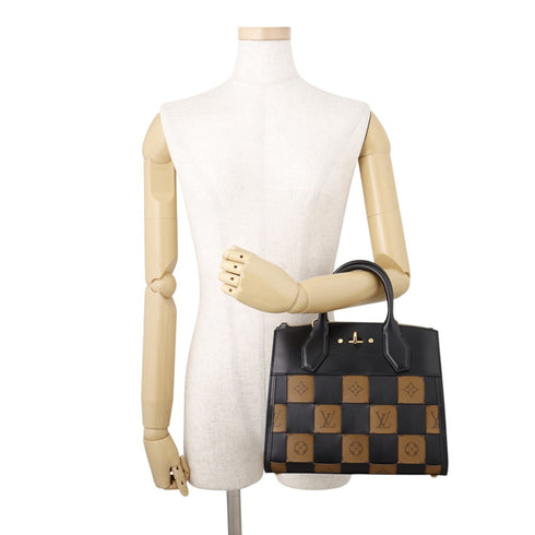 City Steamer Handbag Damier Tressage Reverse Monogram Canvas and Leather PM
