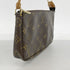 Pochette Accessoires Monogram Canvas