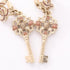 CC Logo Key Earrings Metal