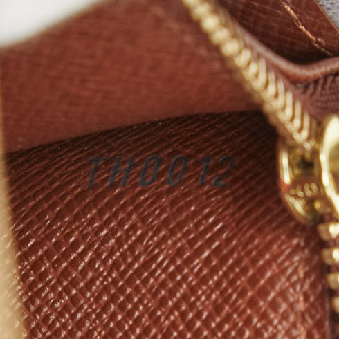 Sarah Wallet Monogram Canvas