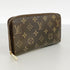 Zippy Wallet Monogram Canvas