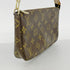 Pochette Accessoires Monogram Canvas