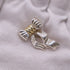 Twist Ribbon Brooch Gold and Sterling Silver