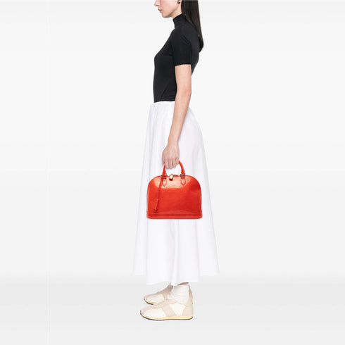 Alma Handbag Monogram Vernis PM