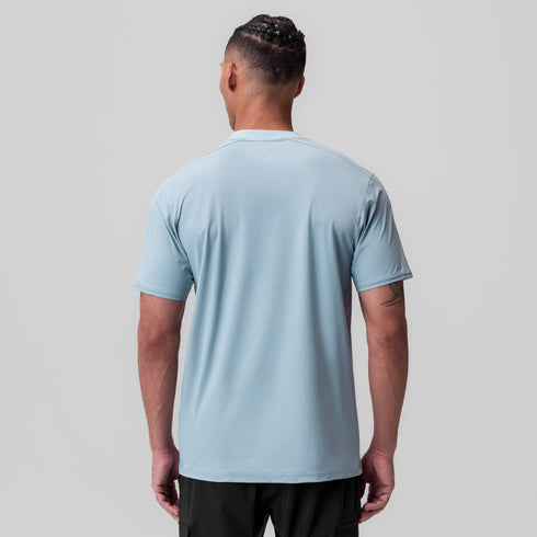 1087. Tetra-Lite® Ice Zip Tee - Light Sky