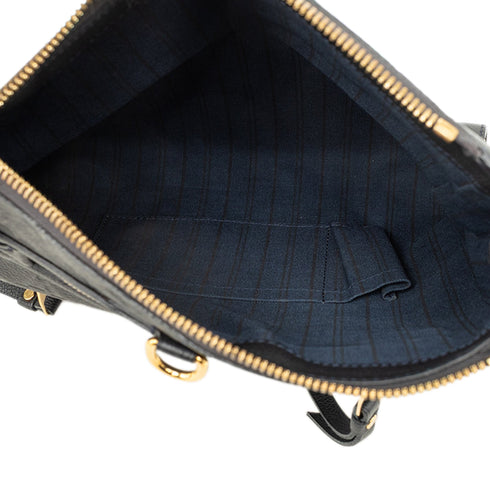 Petillante Clutch Monogram Empreinte Leather