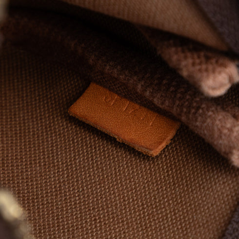 Pochette Accessoires Monogram Canvas Mini