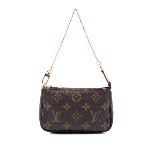 Pochette Accessoires Monogram Canvas Mini