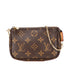 Pochette Accessoires Monogram Canvas Mini