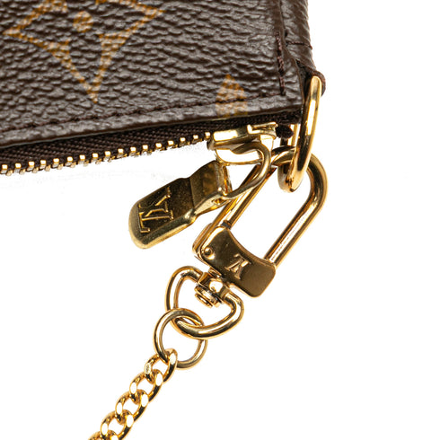 Pochette Accessoires Monogram Canvas Mini