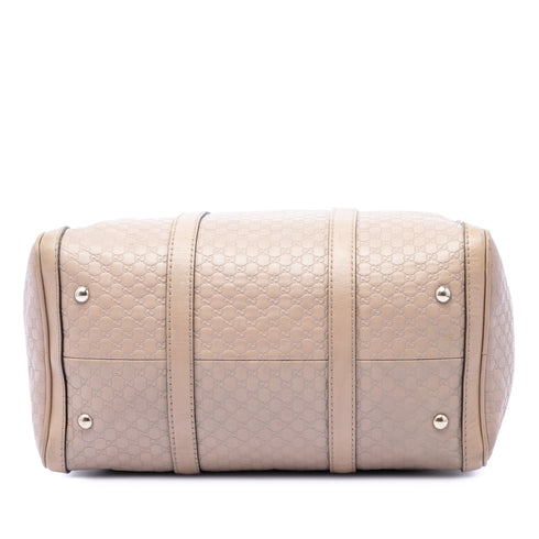 Joy Boston Bag Microguccissima Leather Medium