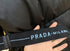 Prada Long Belted Puffer Jacket