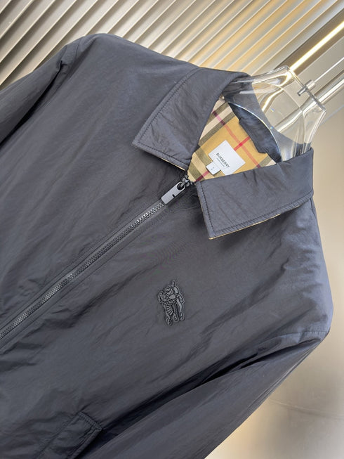 Moncler Black Zip-Front Jacket with Checked Lining